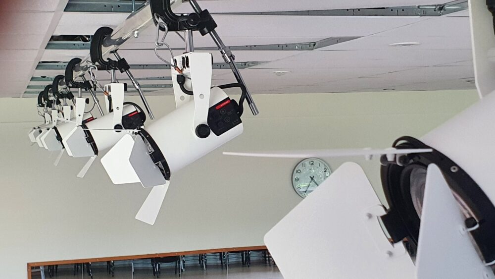 Top rail and hoist system