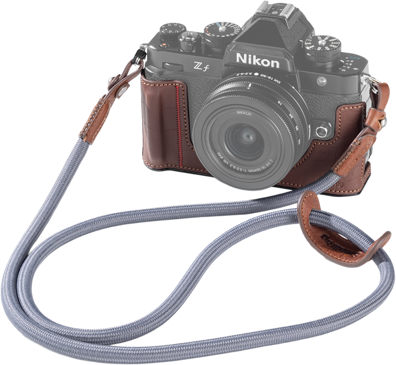 Designed to protect your camera while enhancing its vintage aesthetic. The kit includes a leather case and a shoulder strap.Crafted from PU leather with a mock-croc texture