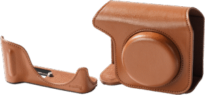 complete with a suede-lined interior to protect the camera and lens from scratches. The half case attaches seamlessly to the full case using a combination of magnetic attraction and Velcro.