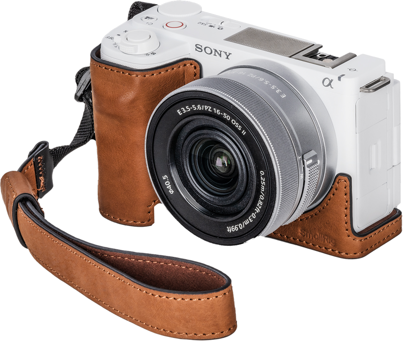 Designed to protect your camera while preserving its classic appeal. The kit includes a leather case and wrist strap