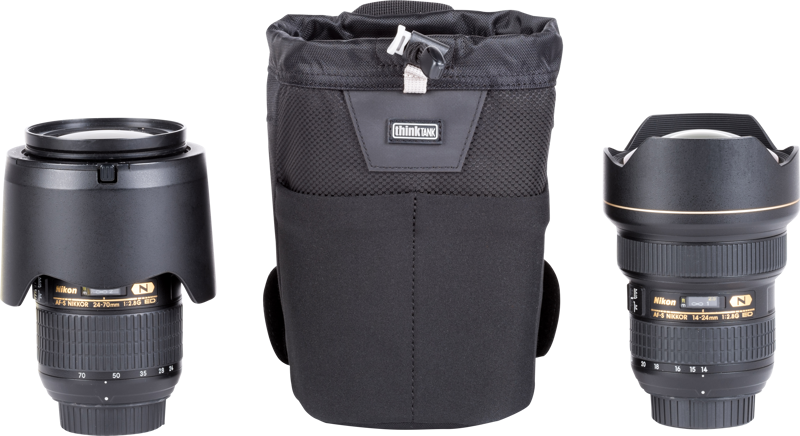 Modular pouch holds a 24–70mm f/2.8 lens with lens hood in shooting position
