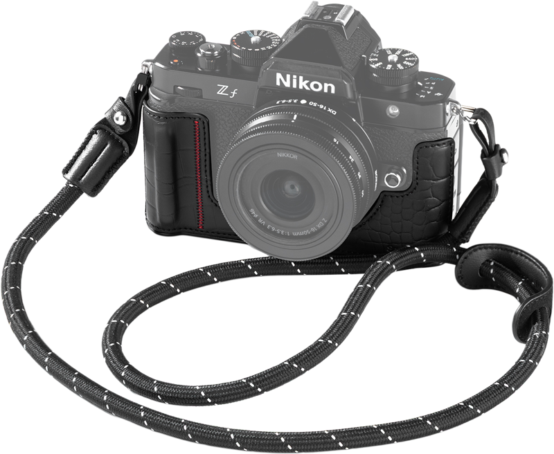 Designed to protect your camera while enhancing its vintage aesthetic. The kit includes a leather case and a shoulder strap.Crafted from PU leather with a mock-croc texture