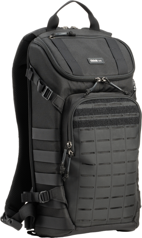 a high-performance camera bag designed for both urban and field use. Equipped with a laser-cut MOLLE panel and tactical webbing rails