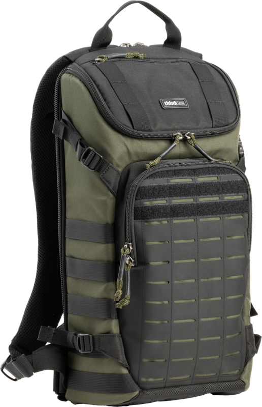 a high-performance camera bag designed for both urban and field use. Equipped with a laser-cut MOLLE panel and tactical webbing rails
