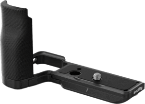 it seamlessly fits the camera after installation. The hinge on the battery compartment contours the camera's curves and improves the grip by addressing pinky placement issues.