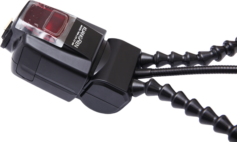 the KX-800 allows you to position light precisely where it's needed—ideal for illuminating small subjects from virtually any angle. A third flexible arm supports an optional LED focusing light