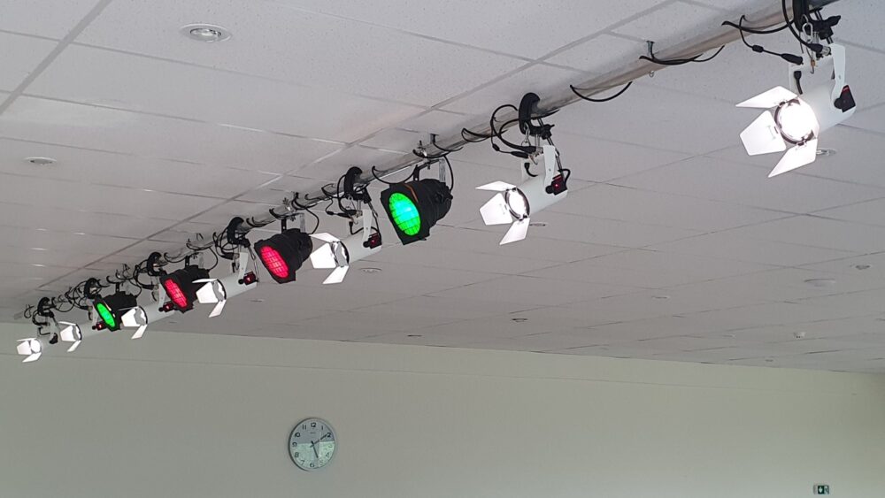 Top rail and hoist system